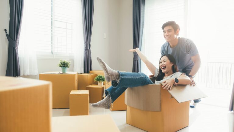 106402965 1582296206841happy young couple enjoying together moving in a new house new house at moving day t20 yxkj7o