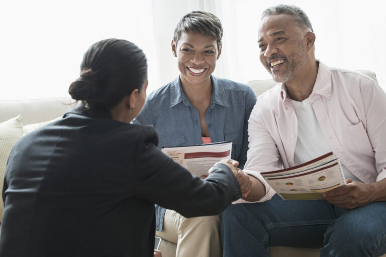 a couple meeting with an advisor