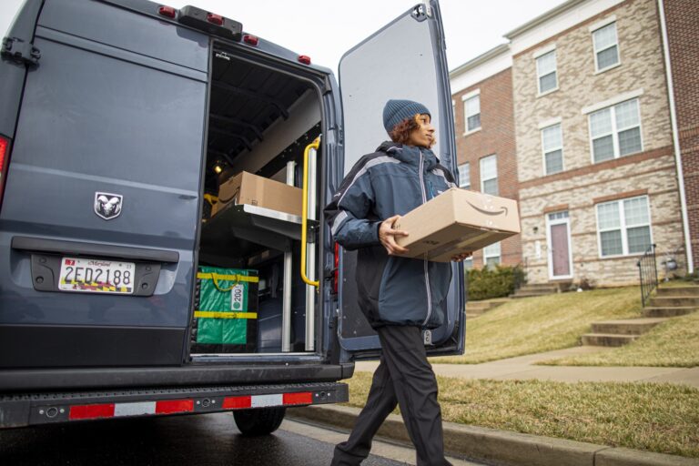 amazon worker delivering package