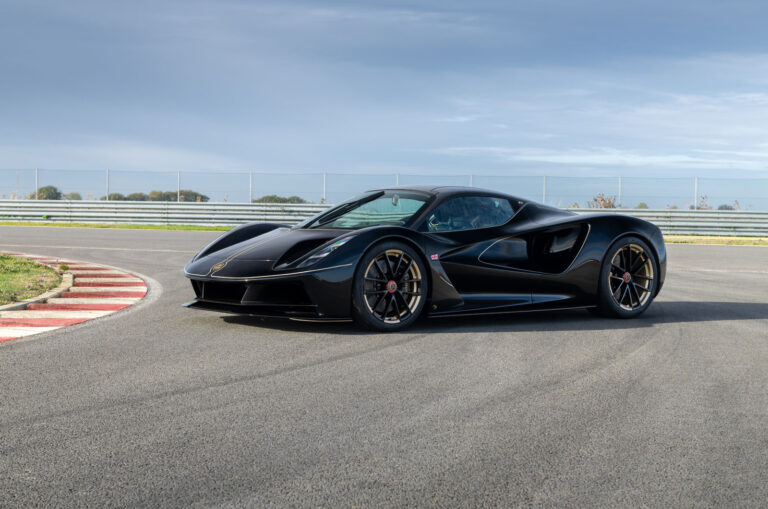 lotus evija fittipaldi edition parked on racetrack front